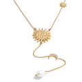Cubic zirconia freshwater pearl heart necklace in gold-plated stainless steel with freshwater pearl and cubic zirconia.