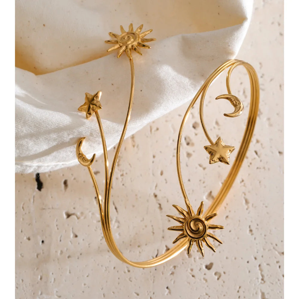 Star moon sun bracelet in gold-plated stainless steel.