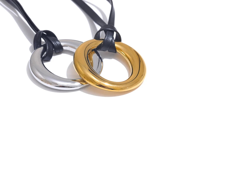 Coin geometric necklace in gold-plated stainless steel.