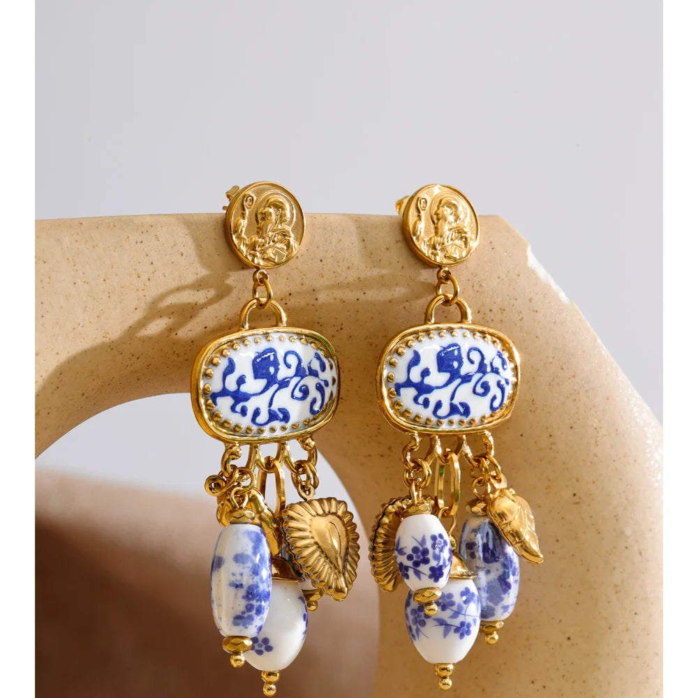 Blue heart flower earrings in gold-plated stainless steel.