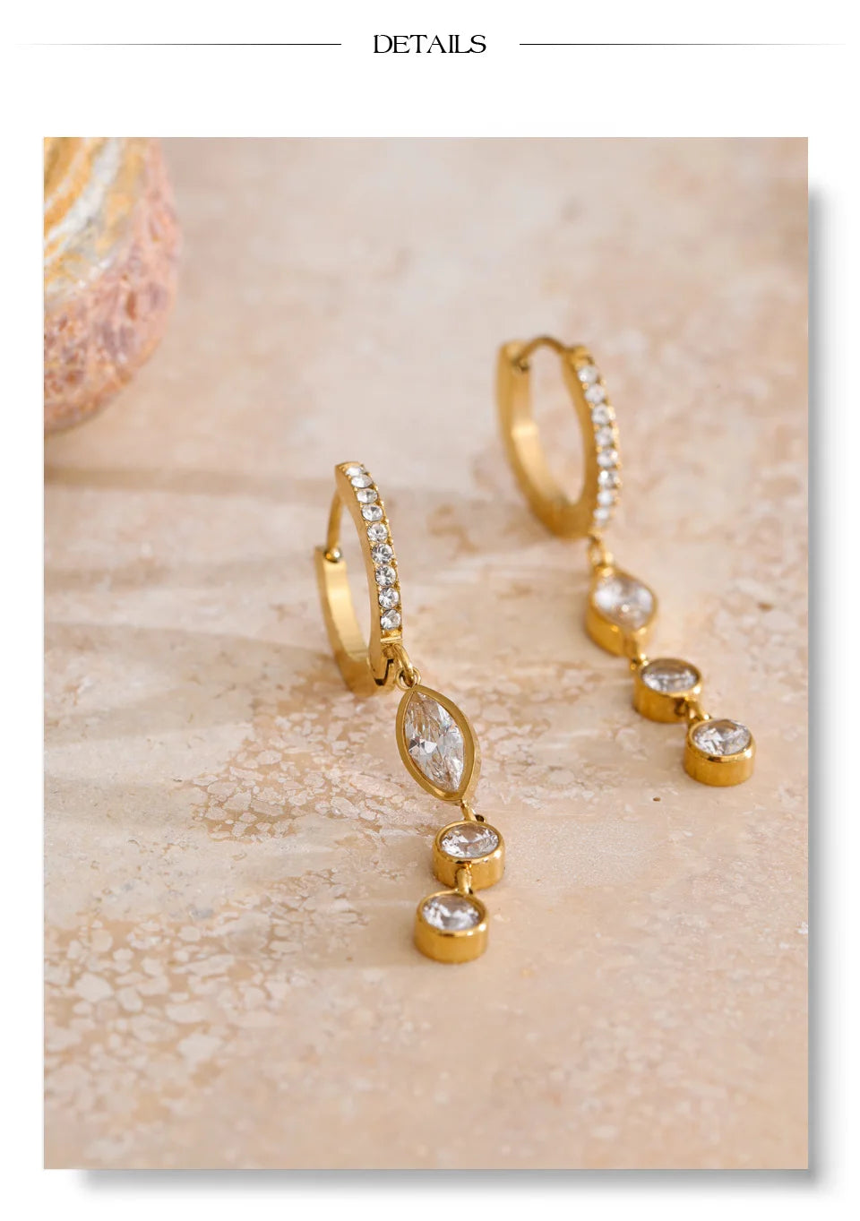Cubic zirconia geometric chain earrings in gold-plated stainless steel with cubic zirconia.