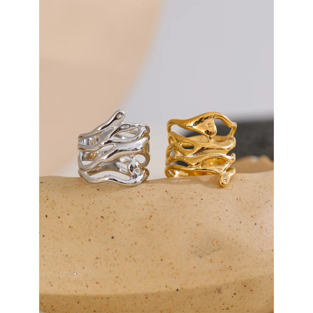 Geometric layered ring in gold-plated 316L stainless steel.