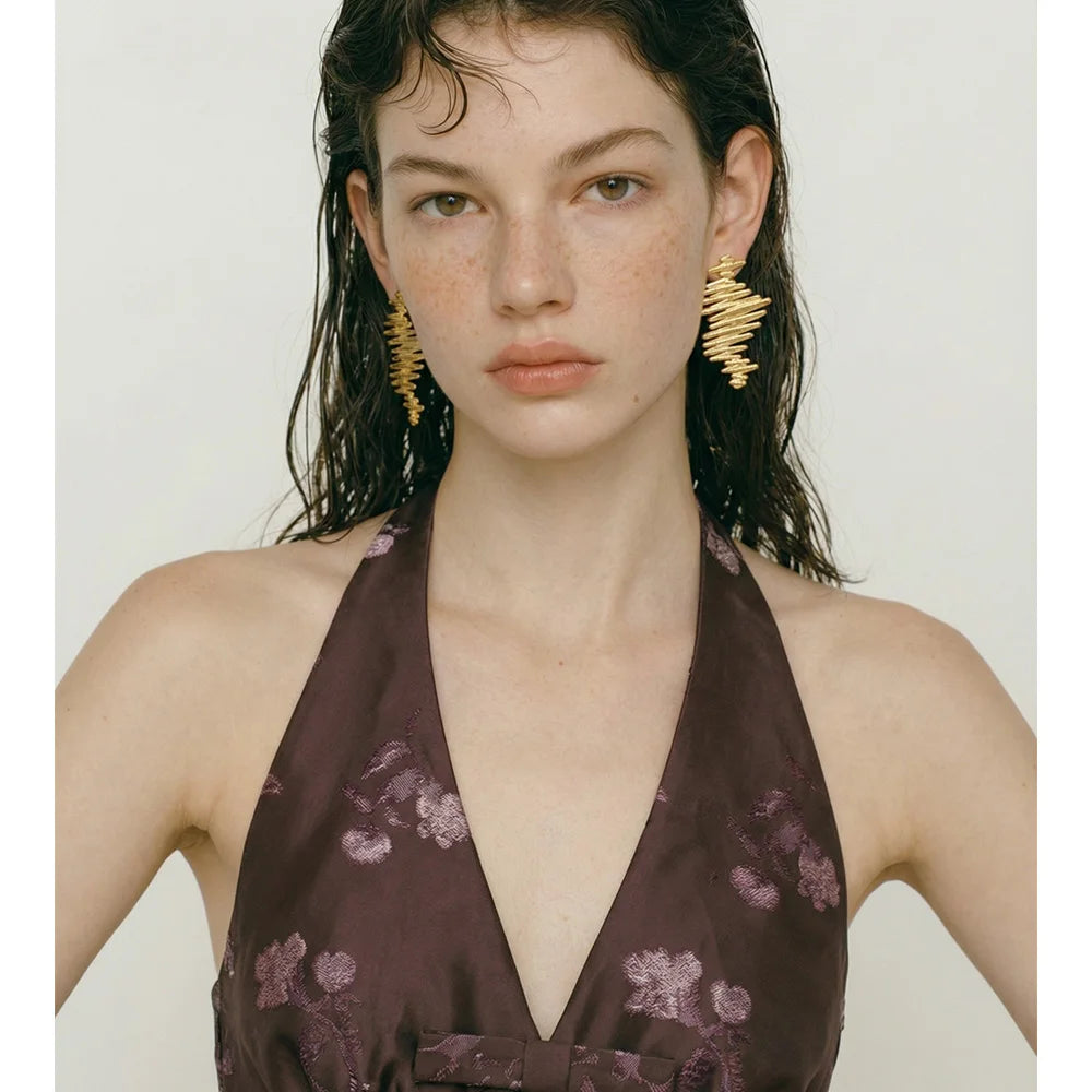 Geometric earrings in gold-plated stainless steel.