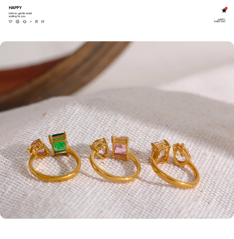 White cubic zirconia geometric ring in 18K gold-plated stainless steel with cubic zirconia.