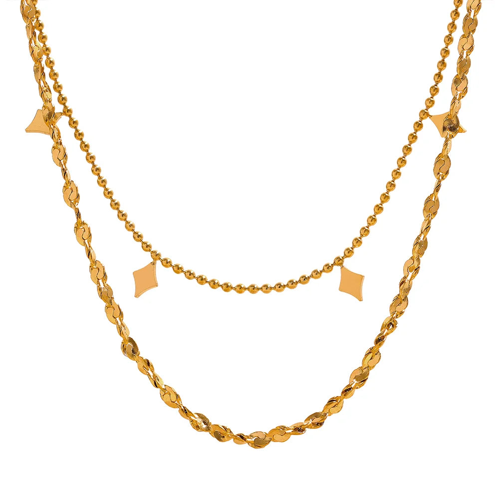 Geometric chain layered necklace in gold-plated stainless steel.