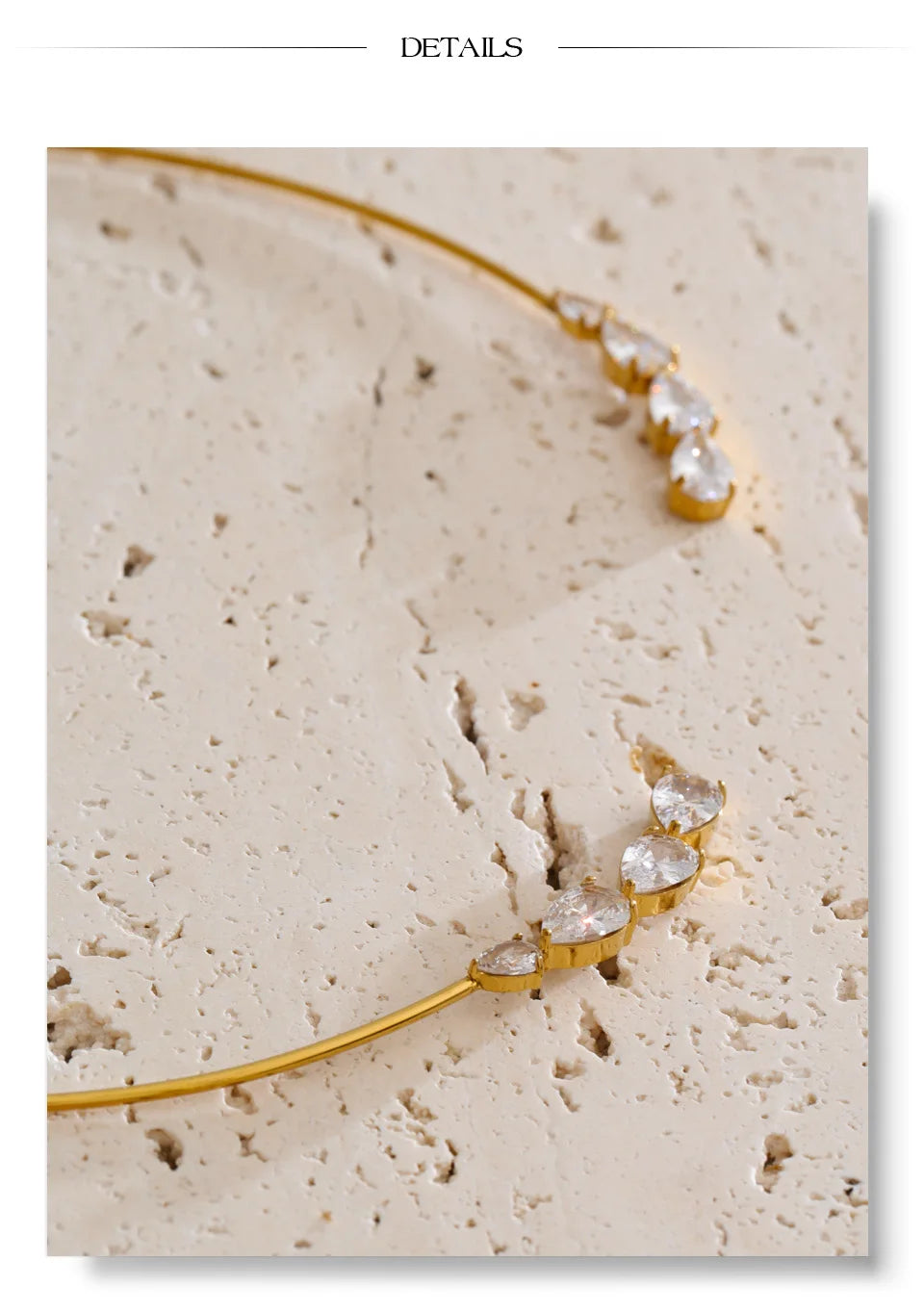 Cubic zirconia geometric necklace in gold-plated stainless steel with cubic zirconia.