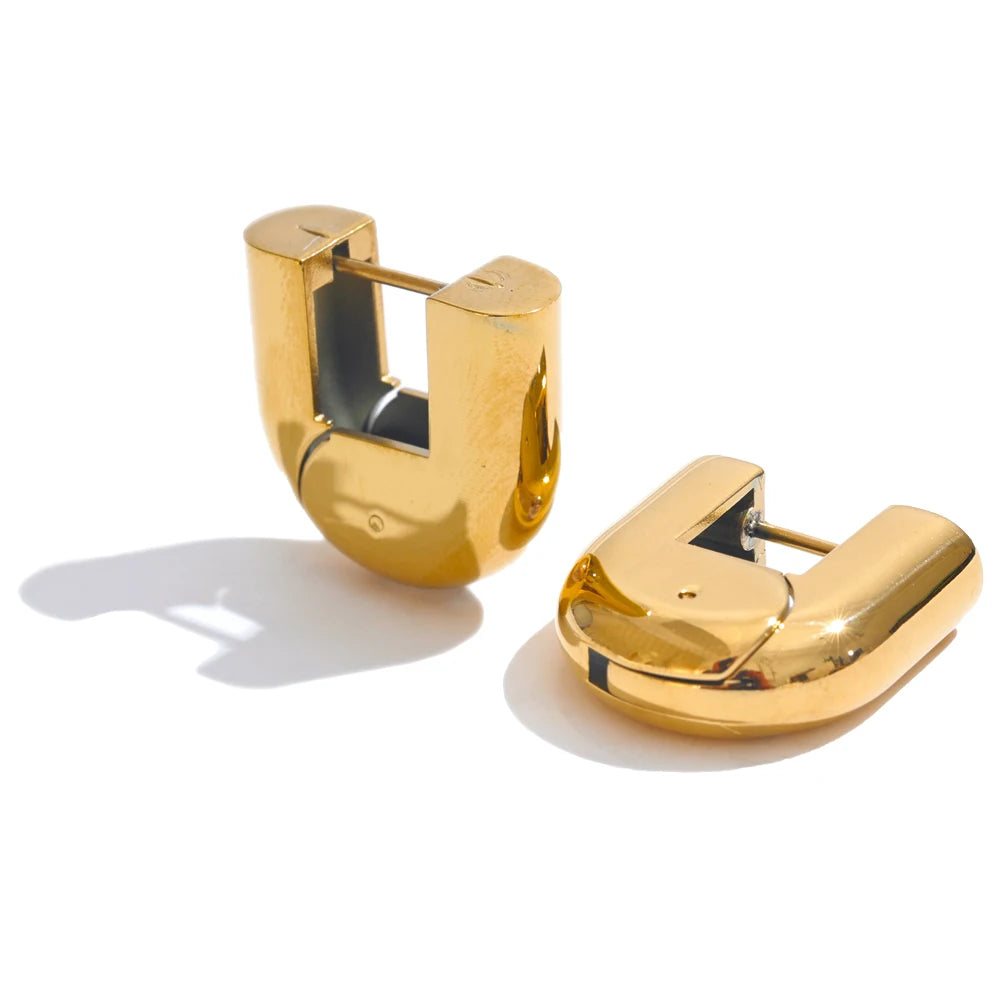 Geometric earrings in gold-plated 316L stainless steel.
