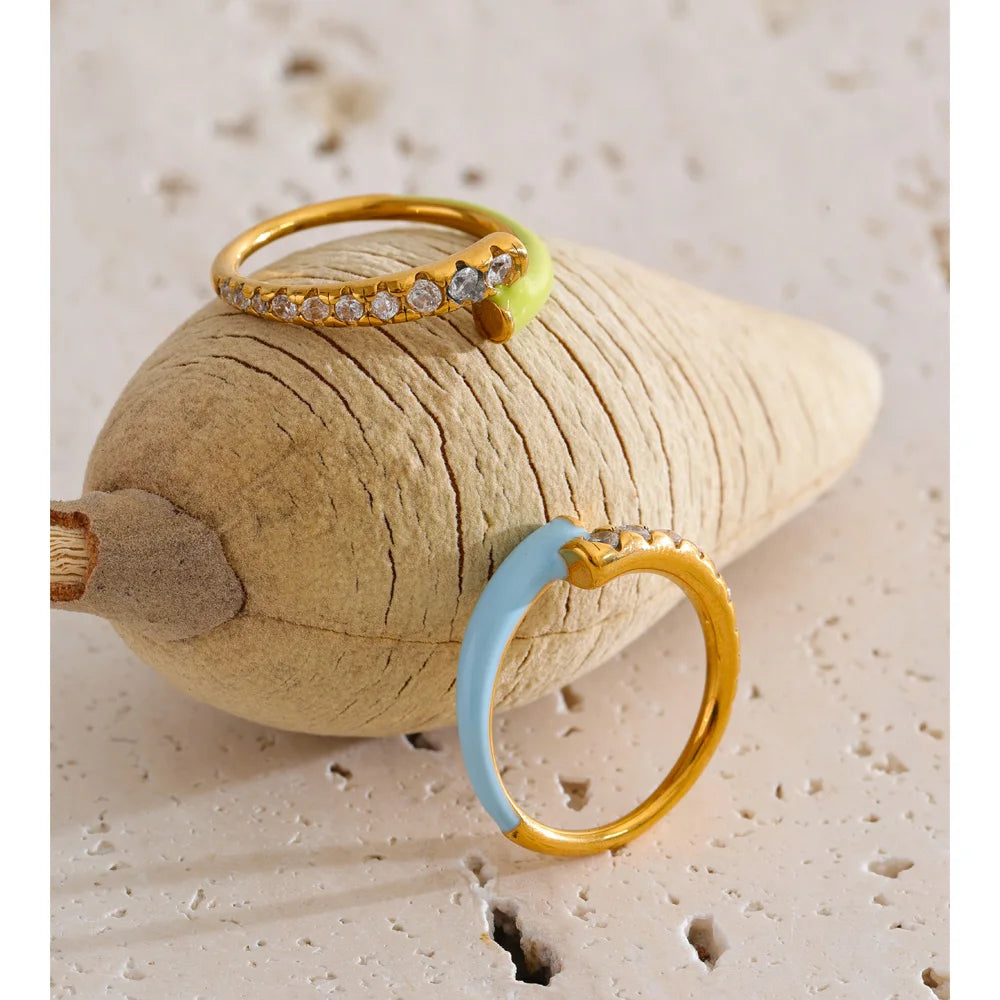 Green cubic zirconia enamel ring in 18K gold-plated stainless steel with cubic zirconia and enamel.