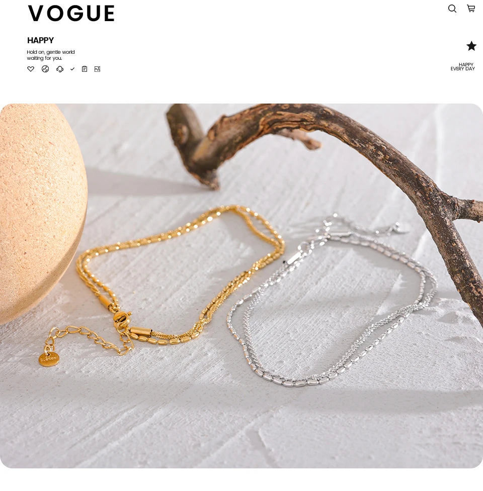 Geometric chain layered necklace in gold-plated stainless steel.