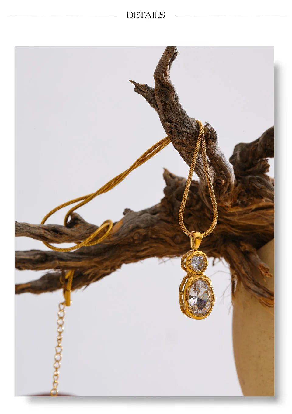 Cubic zirconia geometric necklace in gold-plated stainless steel with cubic zirconia.