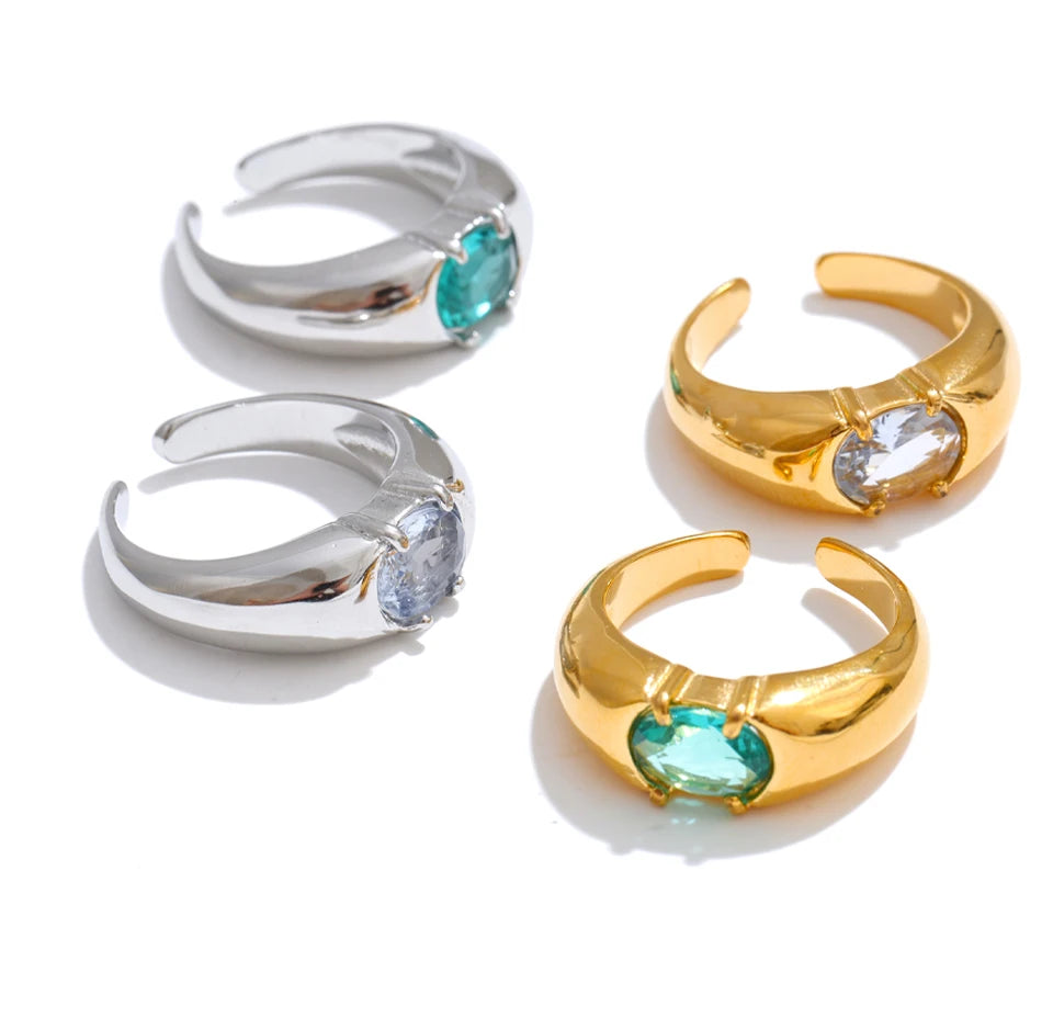 White cubic zirconia geometric ring in 18K gold-plated stainless steel with cubic zirconia.