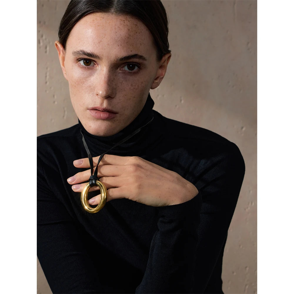 Coin geometric necklace in gold-plated stainless steel.