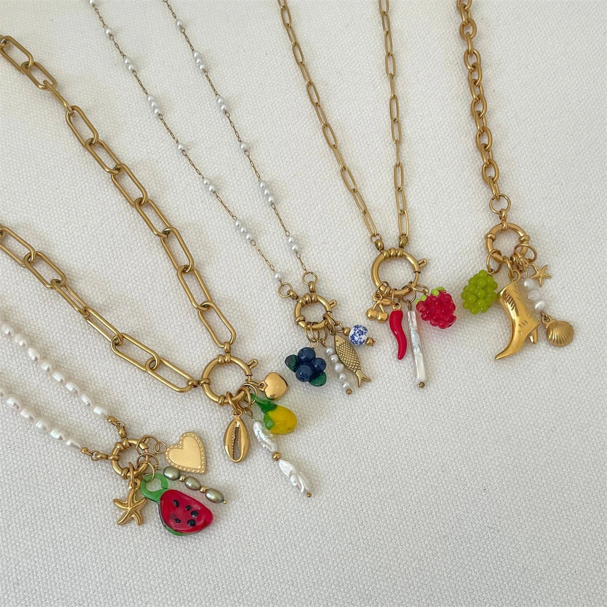 Stainless steel fruit heart boots ins high-end feeling collarbone chain pearl starfish gold-plated color preservation