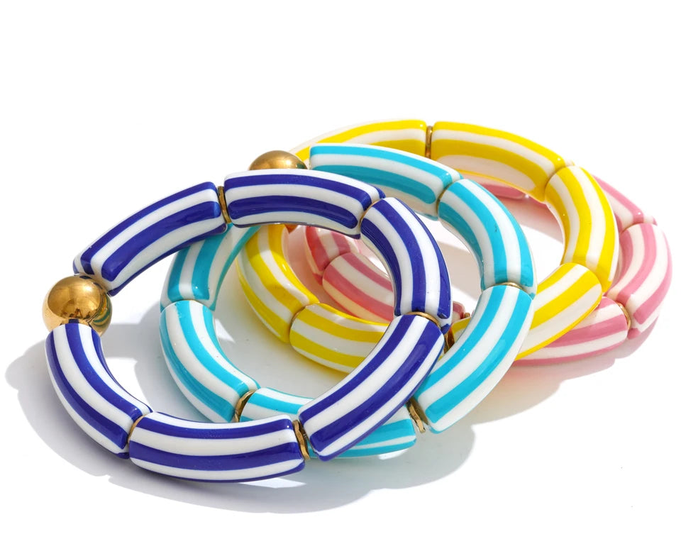 Resin acrylic multi-color bracelet in gold-plated stainless steel with resin and acrylic.