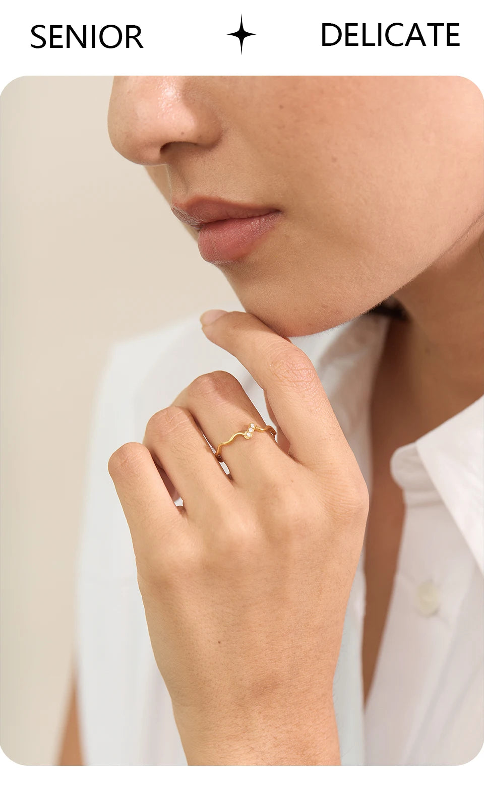 Cubic zirconia minimalist geometric ring in gold-plated stainless steel with cubic zirconia.