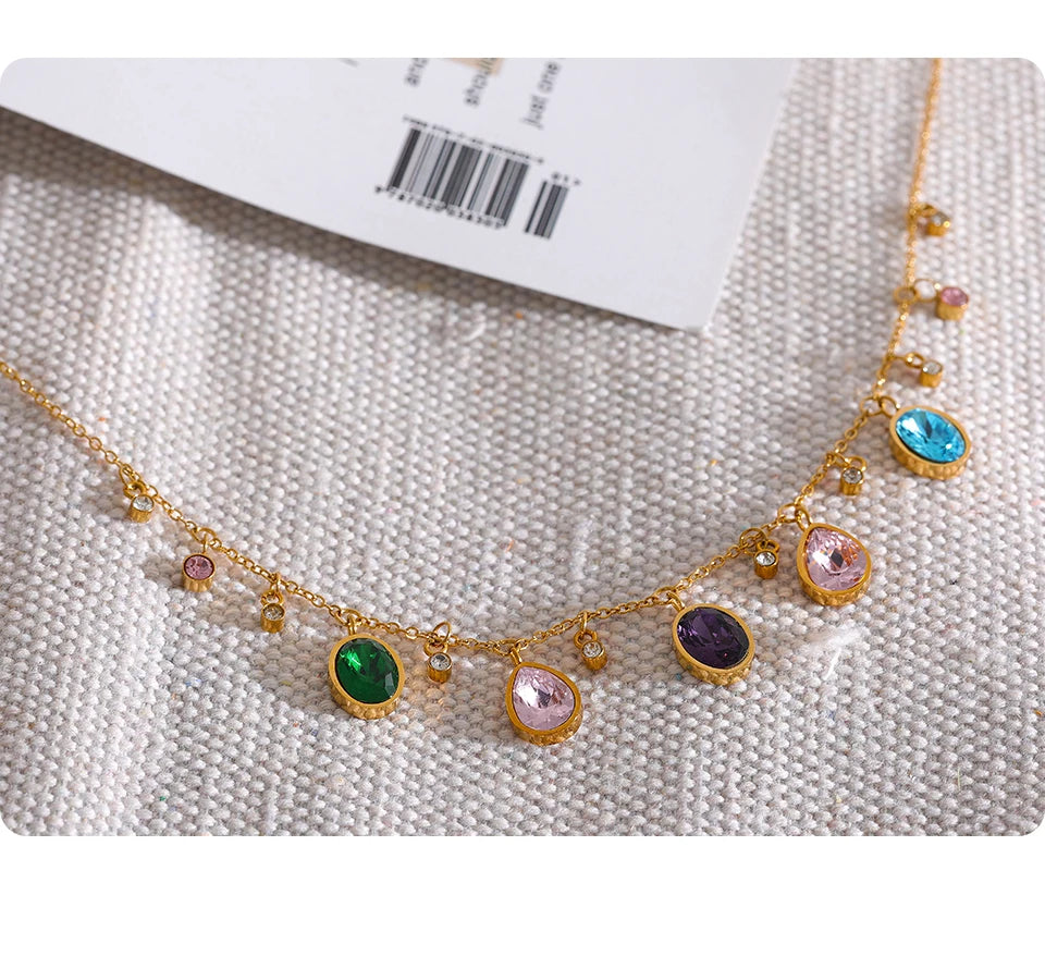 Cubic zirconia multi-color geometric necklace in gold-plated stainless steel with cubic zirconia.