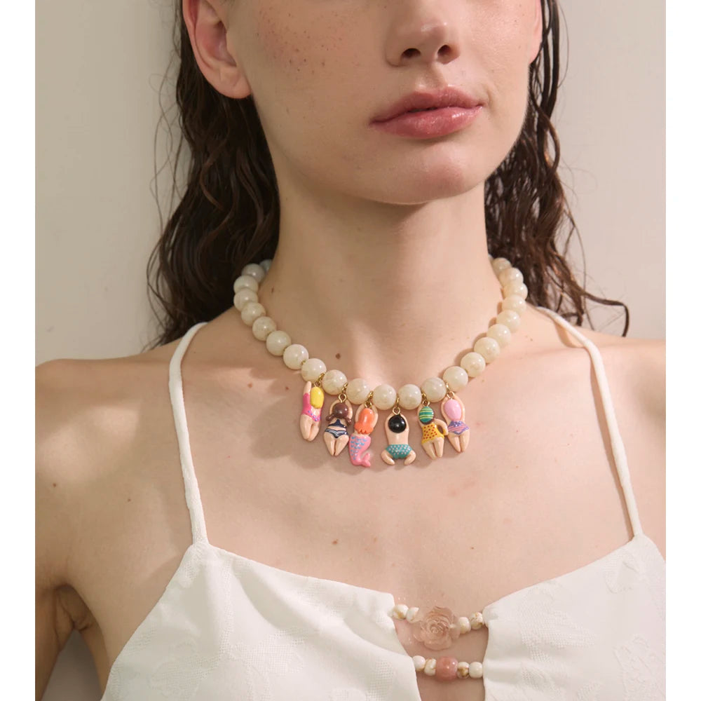 Resin glass natural stone necklace in gold-plated stainless steel with natural stone and resin.