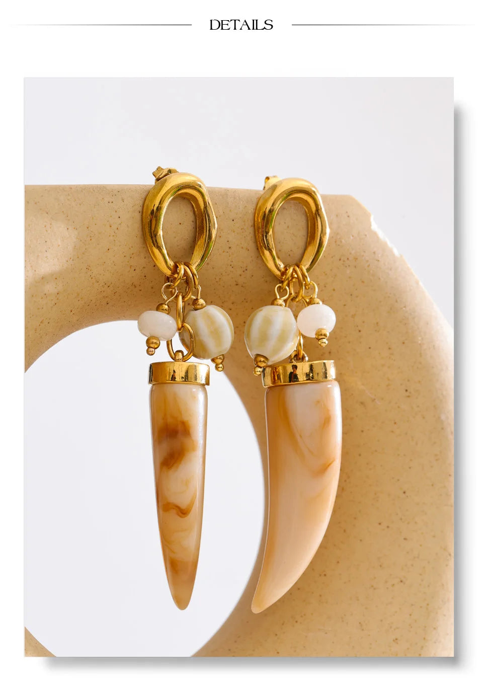 Resin acrylic geometric earrings in gold-plated stainless steel with resin and acrylic.