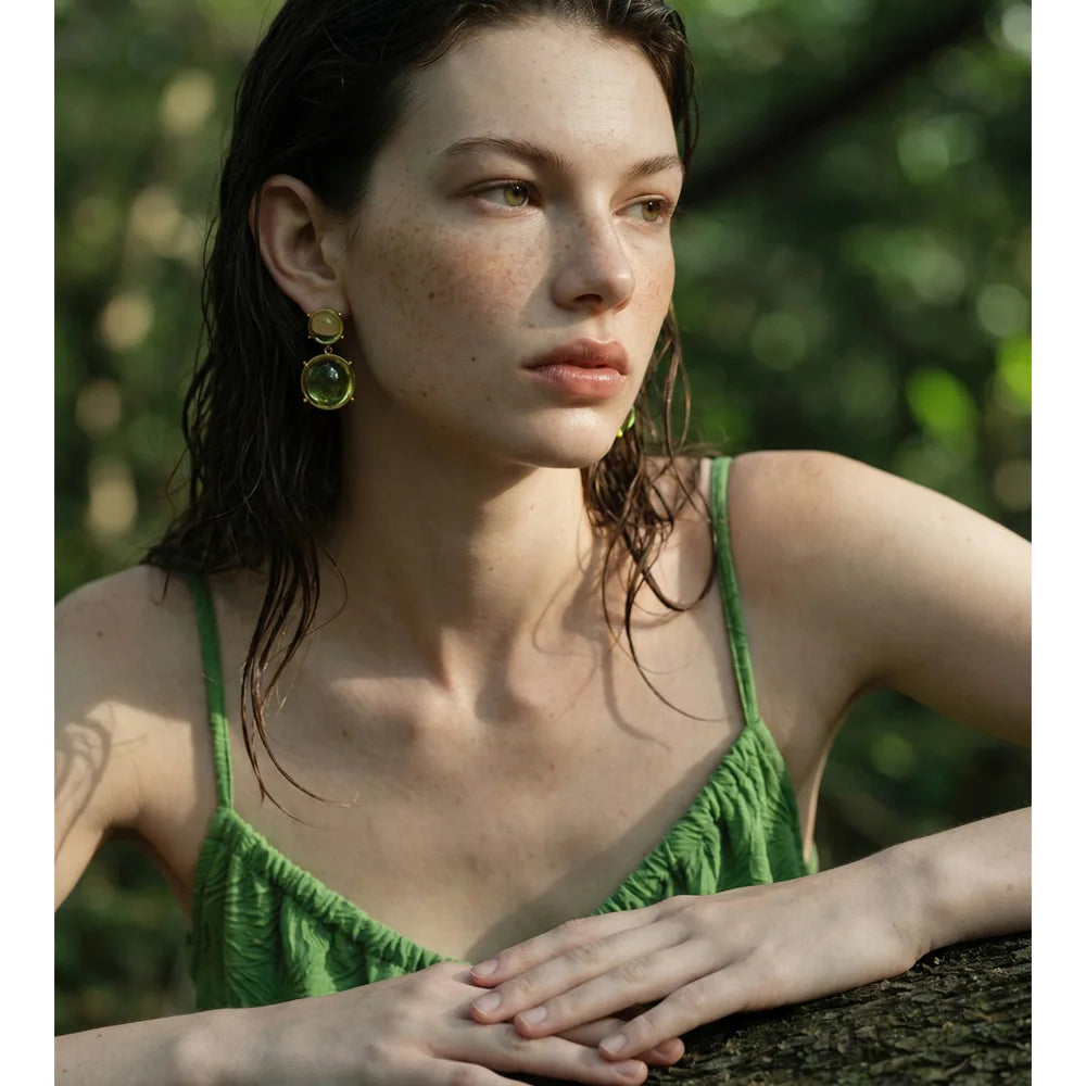 Green resin acrylic earrings in gold-plated stainless steel with resin and acrylic.