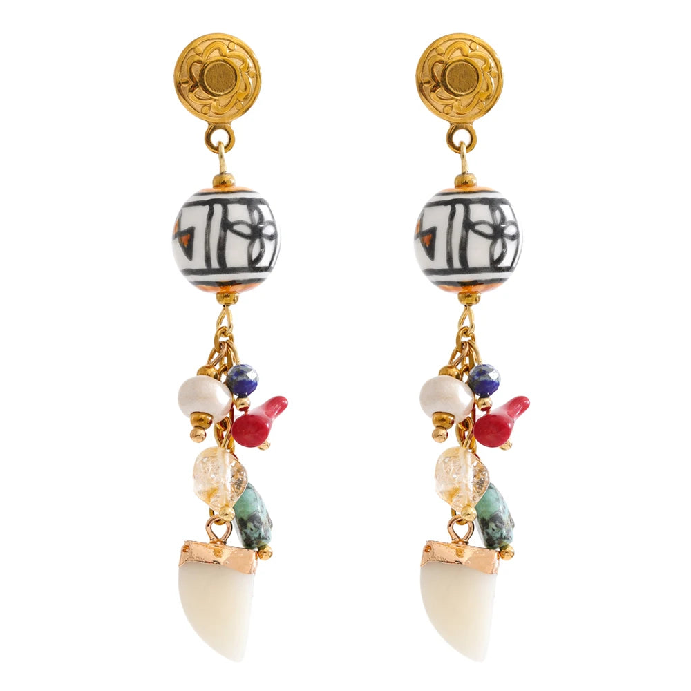 Resin natural stone geometric earrings in gold-plated stainless steel with natural stone and resin.