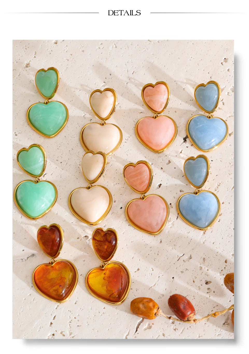 Resin acrylic heart earrings in gold-plated stainless steel with resin and acrylic.