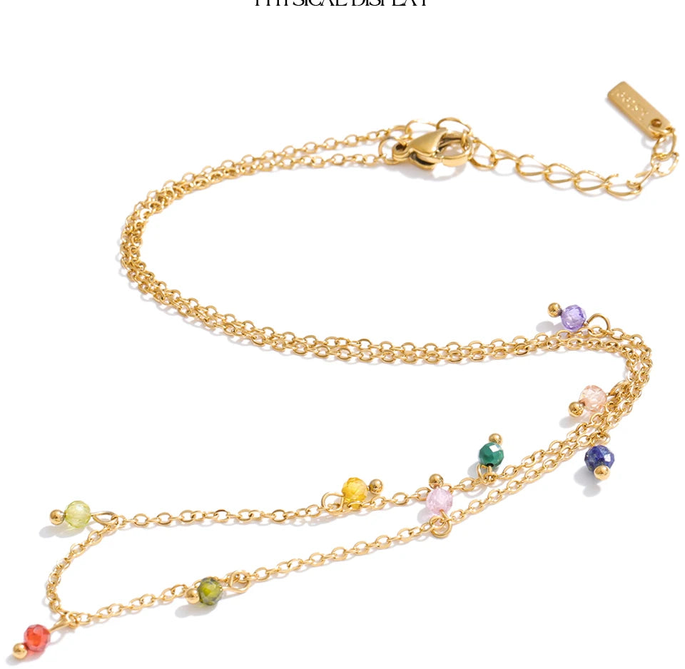 Cubic zirconia multi-color geometric necklace in gold-plated stainless steel with cubic zirconia.