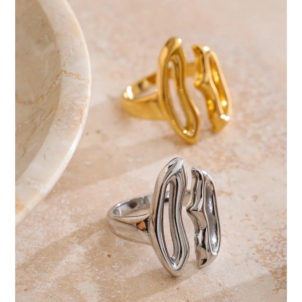 Geometric ring in gold-plated stainless steel.