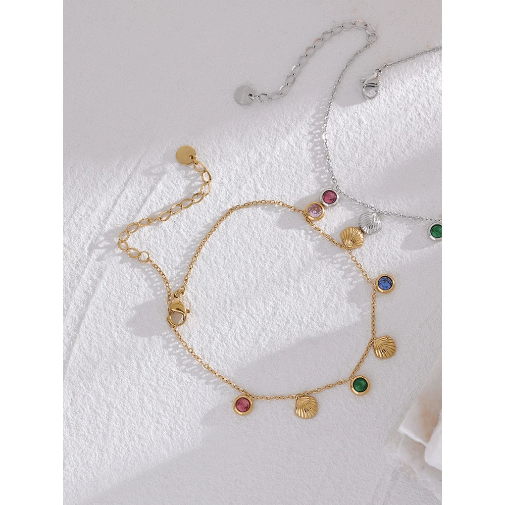 Cubic zirconia shell multi-color anklet in gold-plated stainless steel with cubic zirconia and shell.