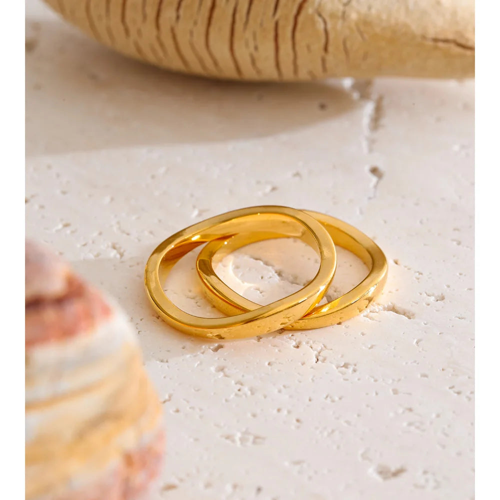 Geometric ring in 18K gold-plated stainless steel.
