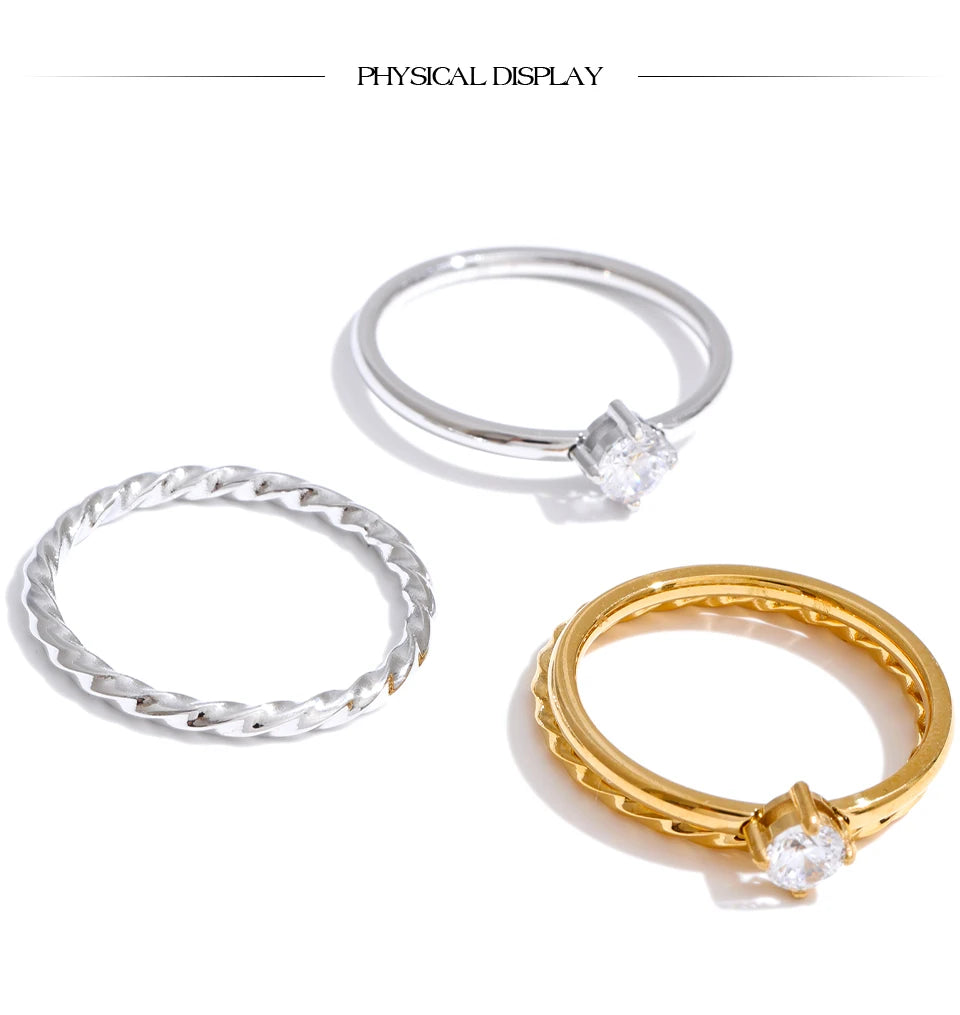 Cubic zirconia geometric ring in gold-plated stainless steel with cubic zirconia.