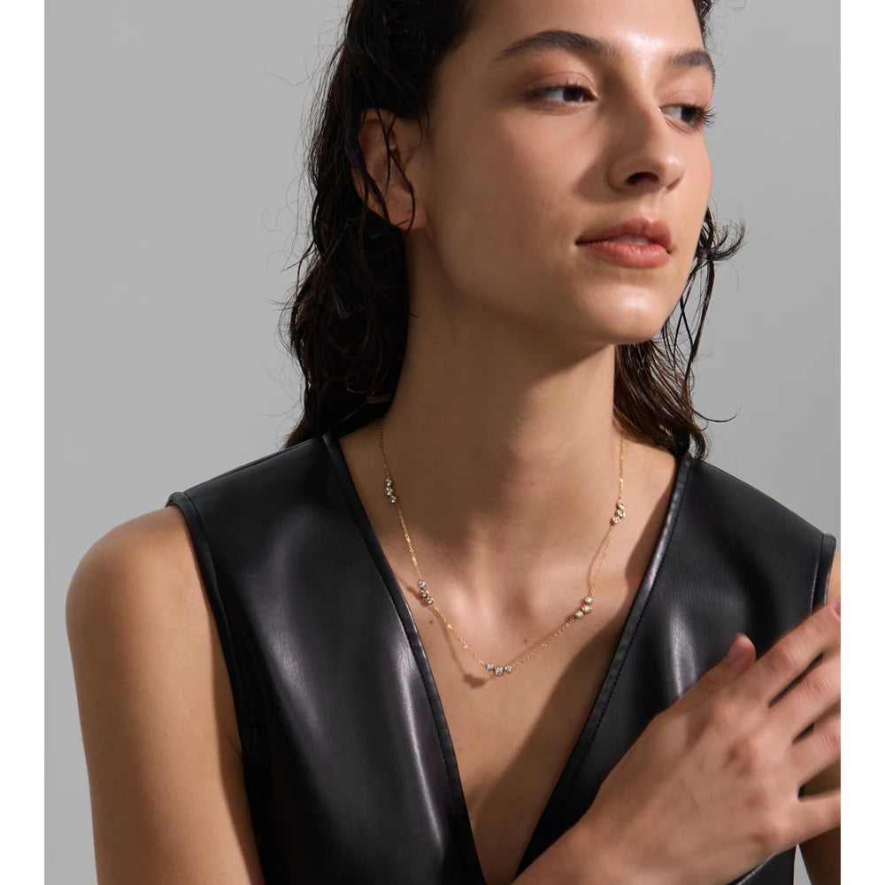 Cubic zirconia geometric chain necklace in gold-plated stainless steel with cubic zirconia.