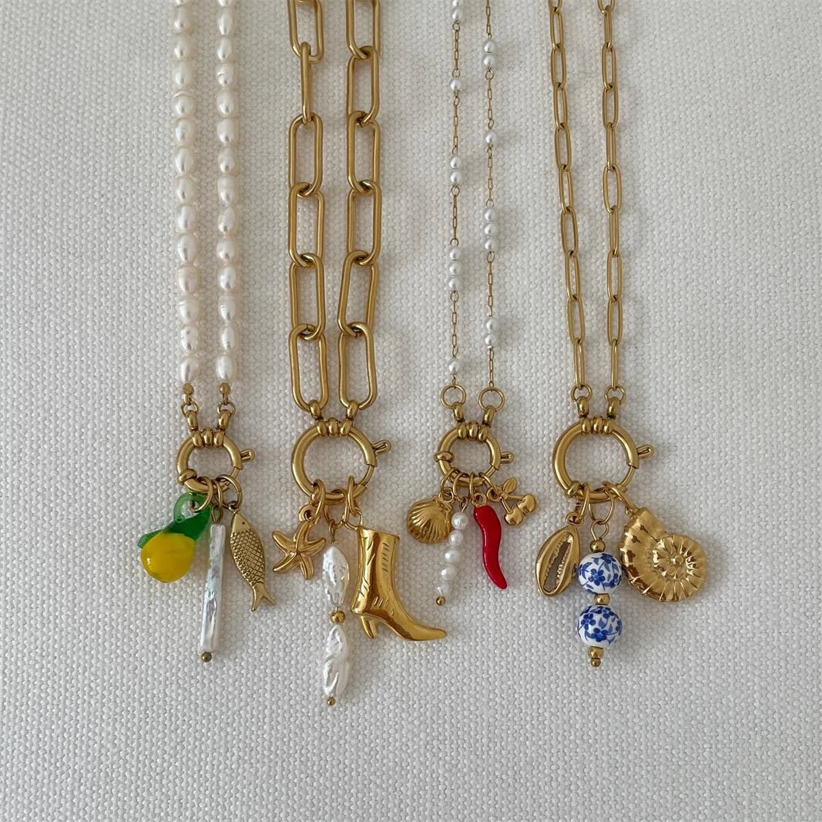 Stainless steel fruit heart boots ins high-end feeling collarbone chain pearl starfish gold-plated color preservation