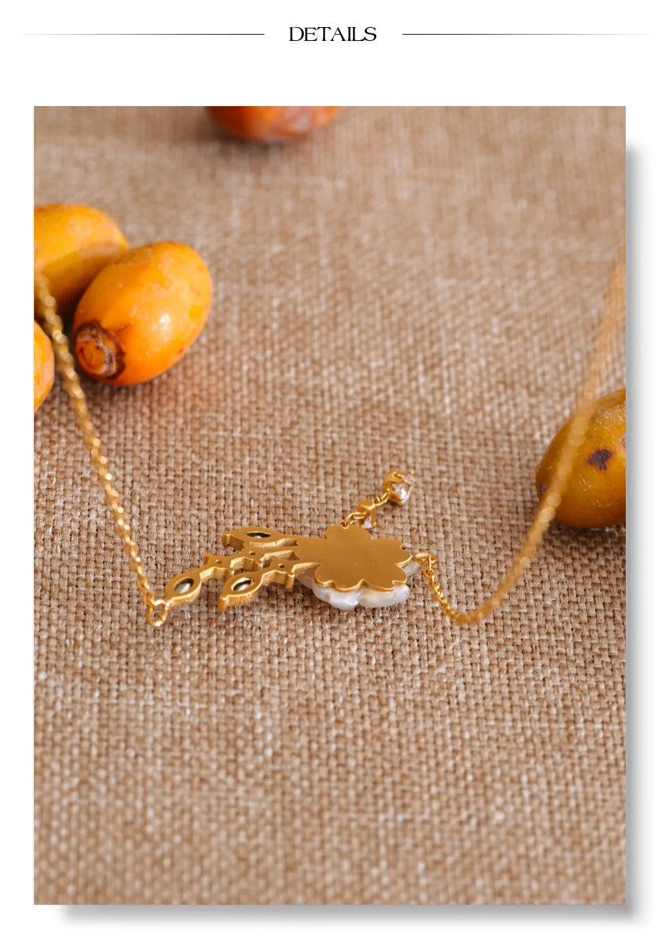 Cubic zirconia shell flower necklace in gold-plated stainless steel with cubic zirconia and shell.