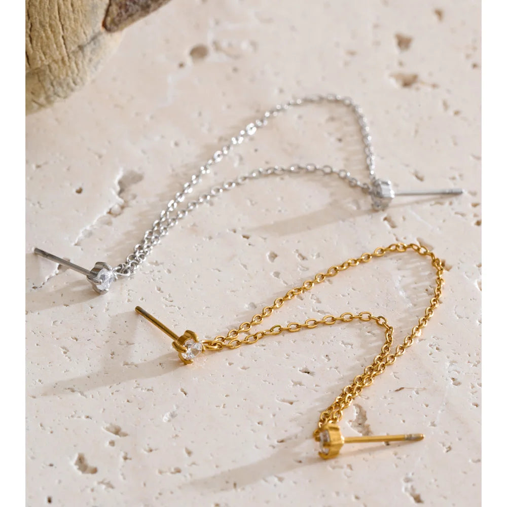 Cubic zirconia geometric chain earrings in gold-plated stainless steel with cubic zirconia.
