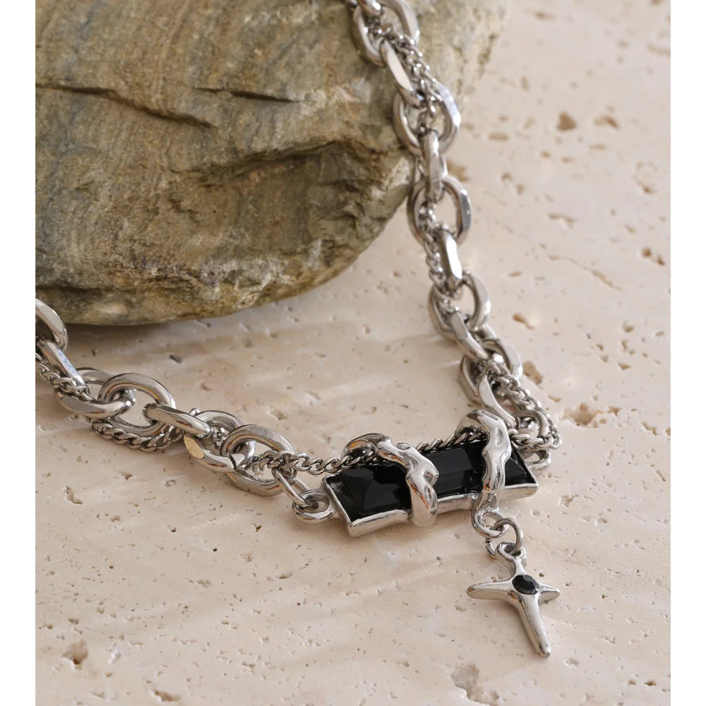 Crystal natural stone cross necklace in gold-plated stainless steel with natural stone and crystal.