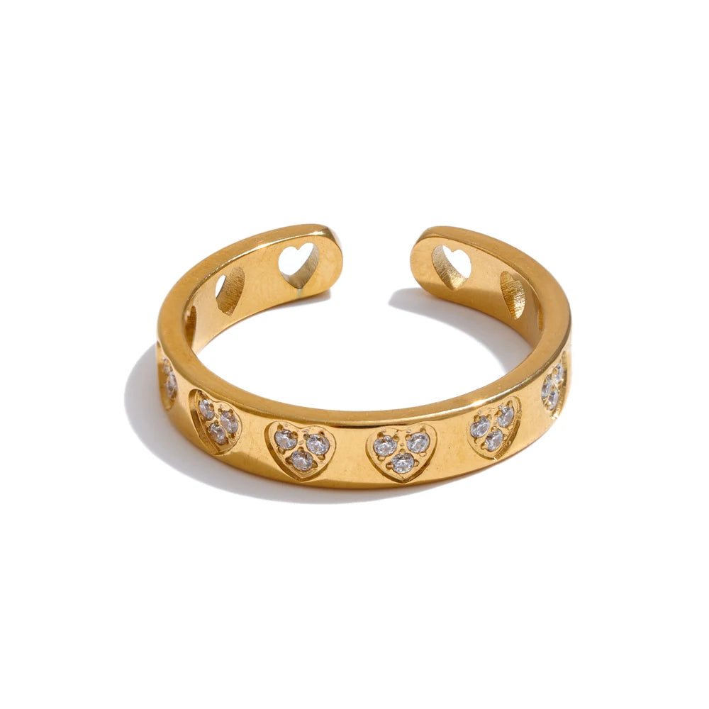 Cubic zirconia heart ring in gold-plated stainless steel with cubic zirconia.