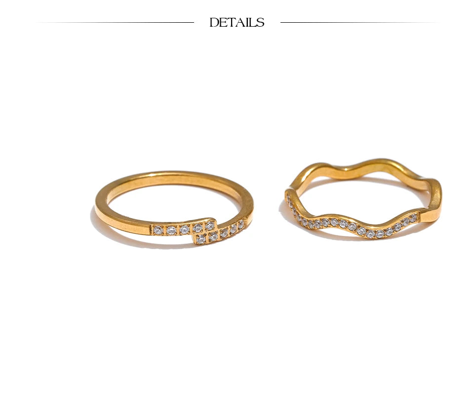 Cubic zirconia geometric ring in 18K gold-plated stainless steel with cubic zirconia.