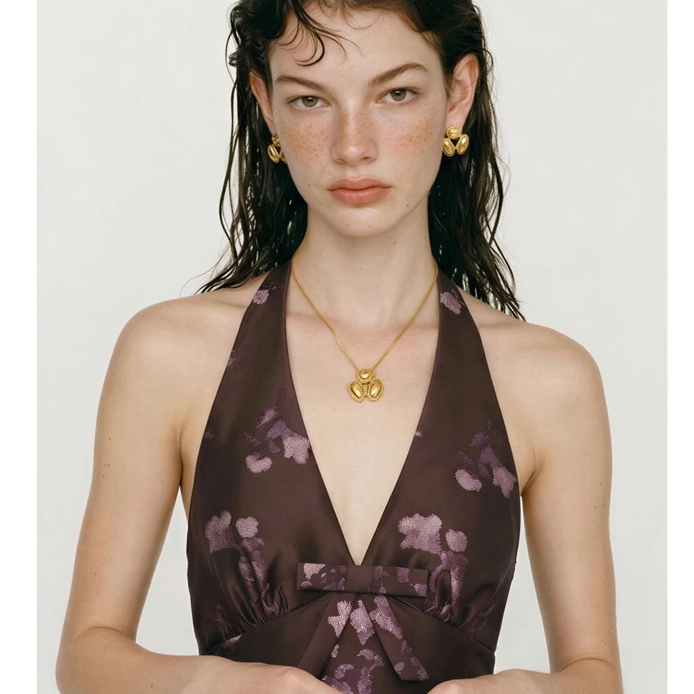 Geometric earrings in gold-plated stainless steel.