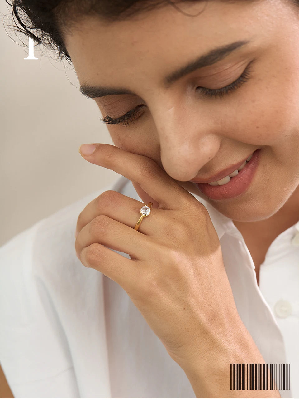 Cubic zirconia geometric ring in 18K gold-plated stainless steel with cubic zirconia.