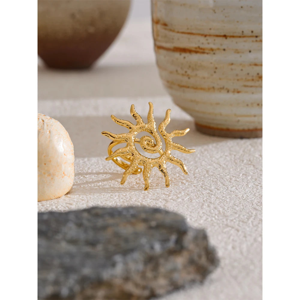 Sun geometric ring in 18K gold-plated stainless steel.