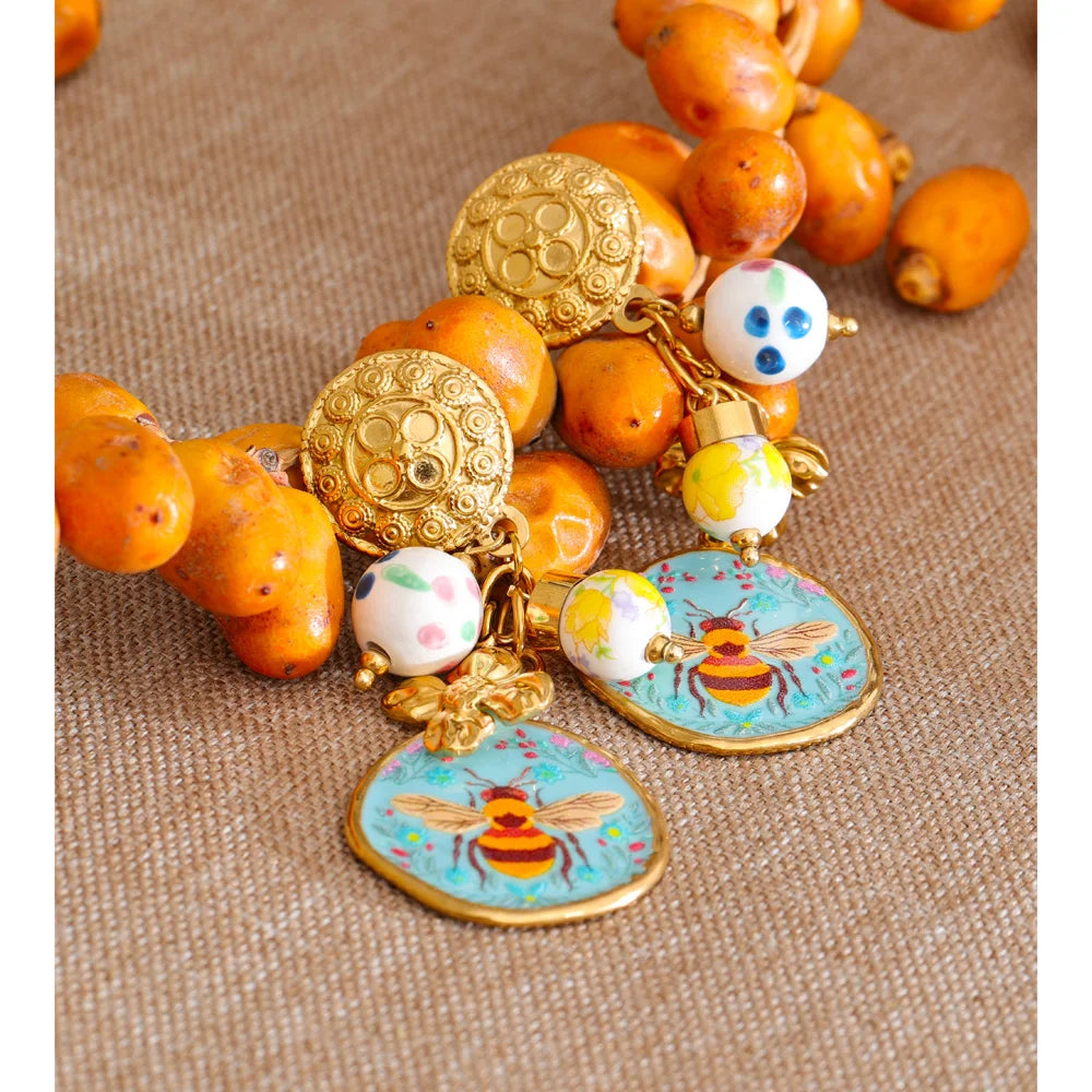 Flower earrings in gold-plated stainless steel.