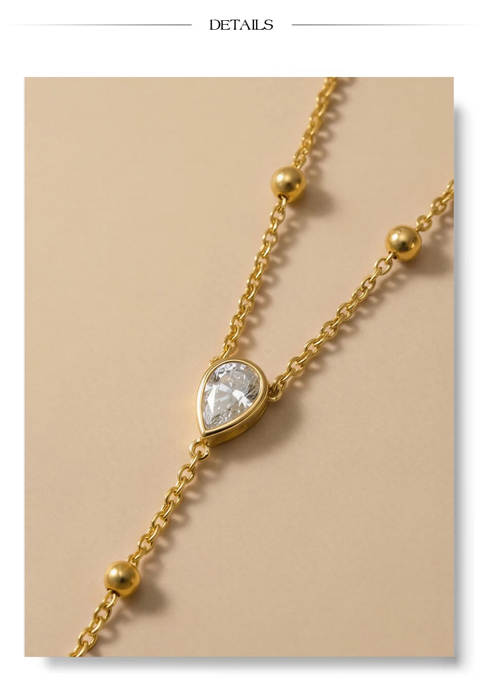 Cubic zirconia pearl geometric necklace in gold-plated stainless steel with pearl and cubic zirconia.