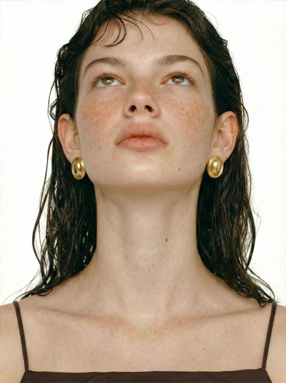 Geometric earrings in gold-plated stainless steel.
