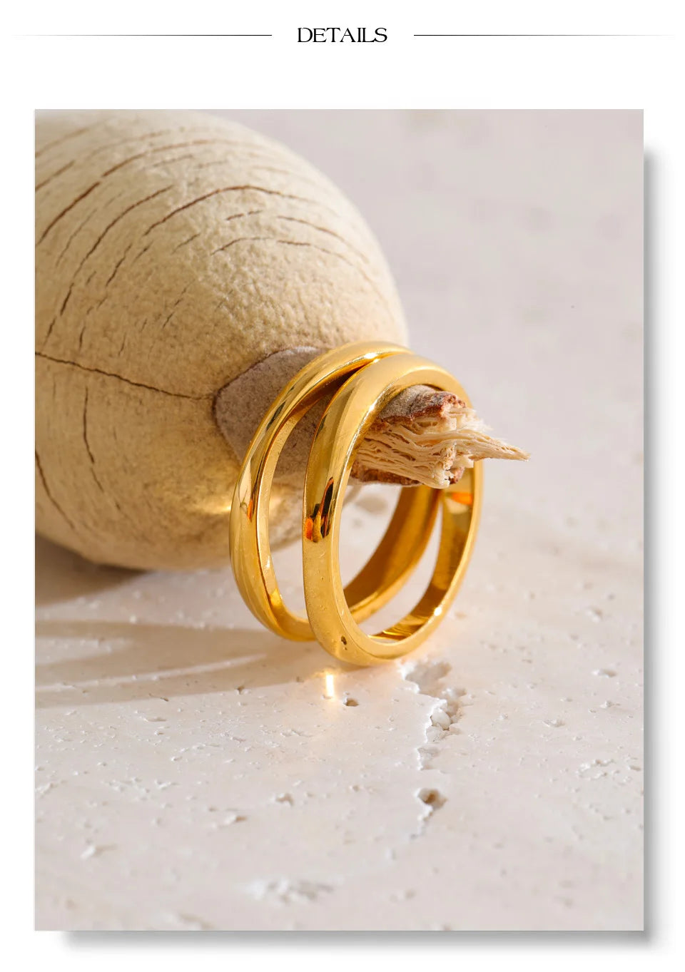 Geometric ring in 18K gold-plated stainless steel.