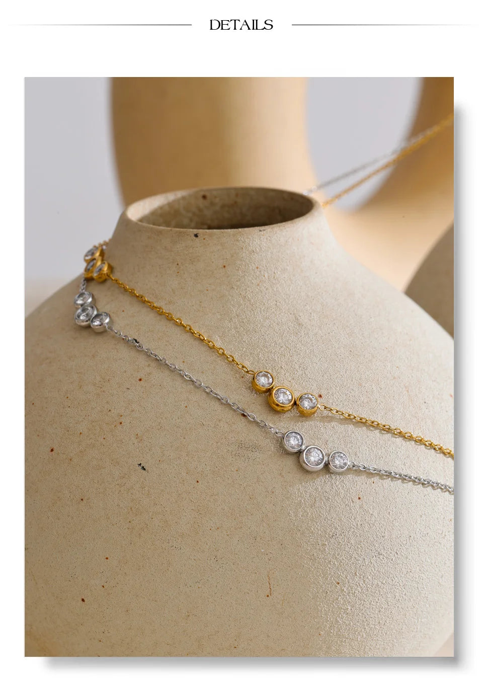 Cubic zirconia geometric chain necklace in gold-plated stainless steel with cubic zirconia.