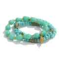 Resin acrylic beaded necklace in gold-plated stainless steel with resin and acrylic.