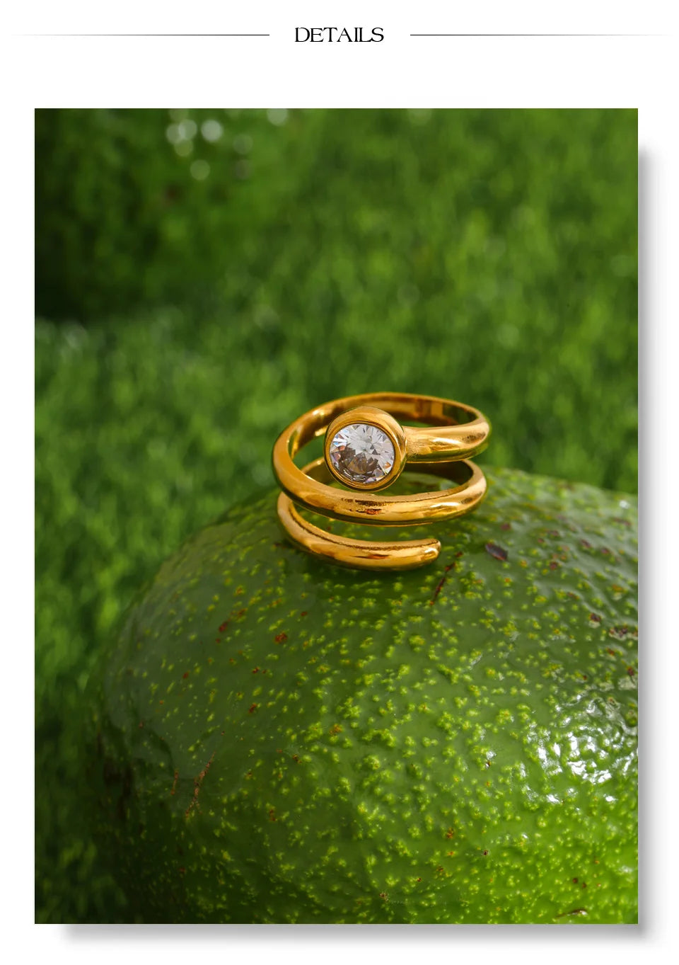 Cubic zirconia geometric layered ring in 18K gold-plated stainless steel with cubic zirconia.