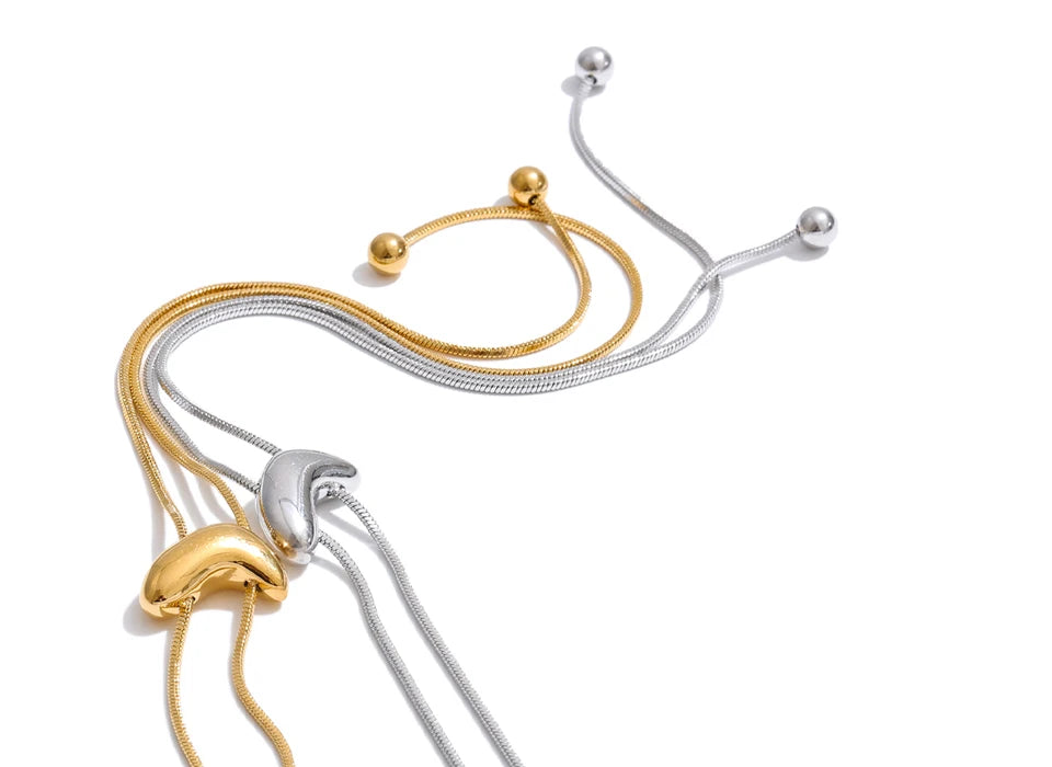Geometric chain necklace in gold-plated stainless steel.