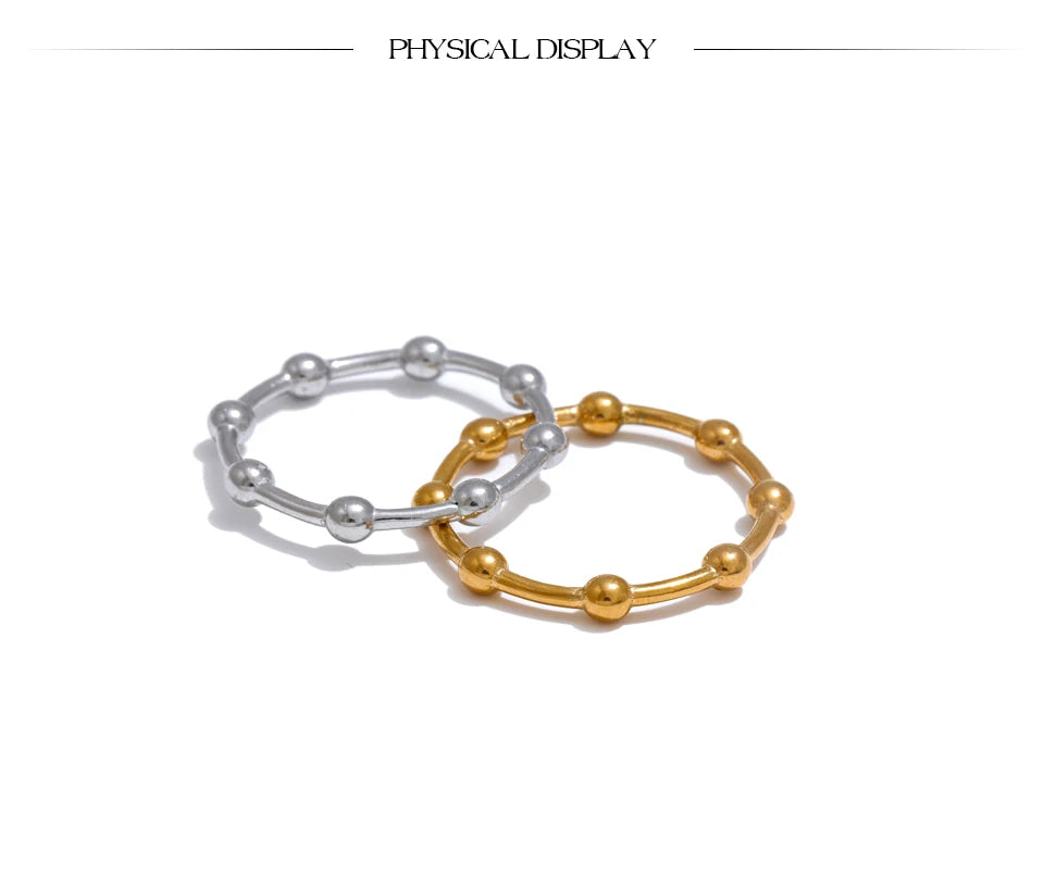 Beaded minimalist geometric ring in 18K gold-plated stainless steel.