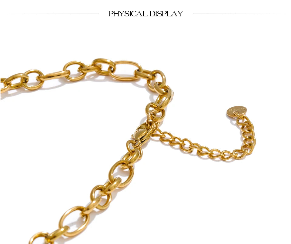 Red heart geometric necklace in gold-plated stainless steel.